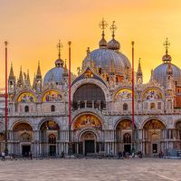 View of Basilica di San Marco and on piazza San Marco in Venice, Italy. Architecture and landmark of Venice. Sunrise cityscape of Venice.