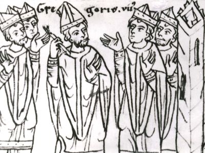 Pope Gregory VII, after his expulsion from Rome, laying a ban of excommunication on the clergy “together with the raging king” (Henry IV of Germany), drawing from the 12th-century chronicle of Otto of Freising; in the library of the University of Jena, Germany.