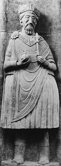 Charlemagne, stucco statue, probably 9th century. Church of St. John the Baptist, Münster, Switz.