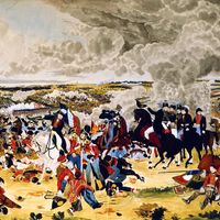 Arthur Wellesley, 1st Duke of Wellington. Battle of Waterloo. Wellesley (1769-1852) British Commander, with his staff, doffs his hat to another officer as the Battle of Waterloo (Napoleon's final defeat) rages around them. June 18, 1815. Napoleonic Wars