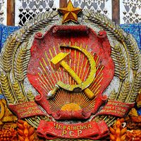 Communism - mosaic hammer and sickle with star on the Pavilion of Ukraine at the All Russia Exhibition Centre (also known as VDNKh) in Moscow. Communist symbol of the former Soviet Union. USSR