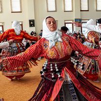 Anatolian Alevi Muslims perform Semah at a Djemevi (cem house or cemevi) to celebrate Newroz -the arrival of spring - the "Rite of Unity". They pray together in this special mass officiated by religious Alevi leader "Dede", performed dhikr and performed Semah - a religious dance, in Ismir, Turkey, March 26, 2022