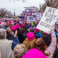 January 21, 2017. Protesters holding signs in crowd at the Women's March in Washington DC. feminism