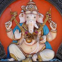 Ganesha. Hinduism. Ganesha, the elephant-headed Hindu god of beginnings, figure on external walls of a South Indian Temple in Kerala, India.