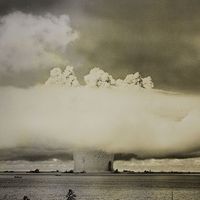 Atomic cloud formation from the Baker Day explosion over the Bikini Atoll; photo created July 25, 1946. (Test Baker, mushroom cloud, underwater nuclear explosion)