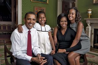 Barack and Michelle Obama with their daughters