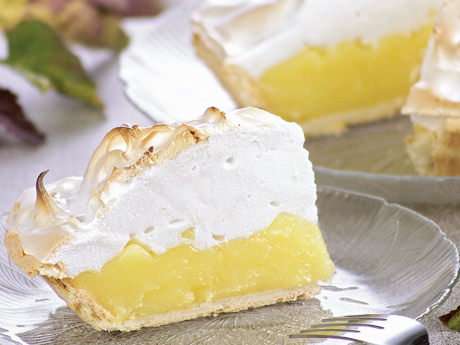 Slices of lemon pie topped with meringue.