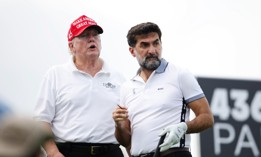 Golf tournaments are just one way foreign governments can line the new president's pockets. This 2022 photo shows Donald Trump and Yasir al-Rumayyan, head of the Saudi sovereign wealth fund, at a LIV Golf tournament at Trump's New Jersey golf course.