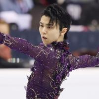 男子フリーで演技する羽生結弦＝イタリア・トリノのパラベラ競技場で２０１９年１２月７日、貝塚太一撮影