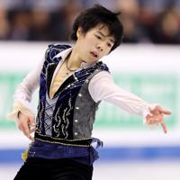 ジュニア男子で優勝した佐藤駿のフリー＝イタリア・トリノのパラベラ競技場で２０１９年１２月７日、貝塚太一撮影