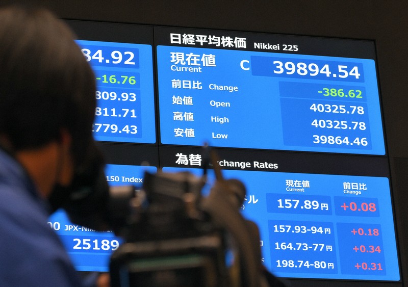 大納会の会場で表示された、2024年の日経平均株価の終値＝東京都中央区の東京証券取引所で2024年12月30日午後3時44分、手塚耕一郎撮影