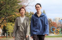 Mana Sato, left, and Kiyotaka Nishi are seen at Odori Park in Sapporo's Chuo Ward on Nov. 3, 2024. (Mainichi/Karen Goto)