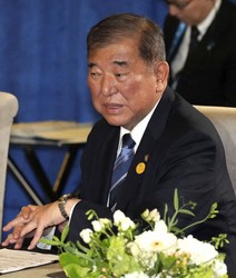 Japanese Prime Minister Shigeru Ishiba speaks during a meeting with U.S. President Joe Biden and South Korean President Yoon Suk Yeol in Lima on Nov. 15, 2024. (Kyodo)