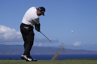 Hideki Matsuyama, of Japan, hits a shot at the 11th hole during the second round of The Sentry golf event, Friday, Jan. 3, 2025, at the Kapalua Plantation Course in Kapalua, Hawaii. (AP Photo/Matt York)