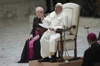 Pope Francis talks during an audience with Catholic associations of teachers and students' parents in the Paul VI Hall, at the Vatican, on Jan. 4, 2025. (AP Photo/Alessandra Tarantino)