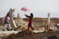 A family arrives to cross into Lebanon through the Jousieh border crossing, between Syria and Lebanon, Nov. 28, 2024, following a ceasefire between Israel and Hezbollah. (AP Photo/Omar Sanadiki, File)