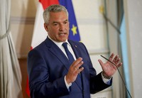 Austrian Chancellor Karl Nehammer attends a press conference in Vienna on Aug. 8, 2024. (AP Photo/Heinz-Peter Bader, File)