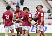 Brave Lupus Tokyo center Seta Tamanivalu (2nd from left) and teammates react after beating the Kobe Steelers in a Japan Rugby League One match at Ajinomoto Stadium in Tokyo on Dec. 5, 2025. (Kyodo)