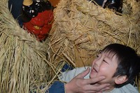 A child promises an "amahage" demon deity, "I'll be a good child," in Yuza, Yamagata Prefecture, on Jan. 3, 2025. (Mainichi/Rika Chonan)