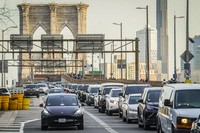 Traffic enters lower Manhattan after crossing the Brooklyn Bridge in New York on Feb. 8, 2024. (AP Photo/Bebeto Matthews, File)