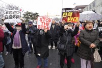 Supporters of impeached South Korean President Yoon Suk Yeol attend a rally to oppose his impeachment near the presidential residence in Seoul, South Korea, on Jan. 5, 2025. (AP Photo/Ahn Young-joon)