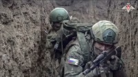 In this photo taken from video distributed by the Russian Defense Ministry Press Service on Jan. 4, 2025, Russian servicemen attend a combat training for assault units in an undisclosed location. (Russian Defense Ministry Press Service via AP)