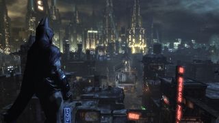 Batman looking over the city during Batman: Arkham City, one of the best PS3 games.