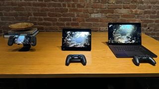 an iphone, ipad, and mac on a wooden table