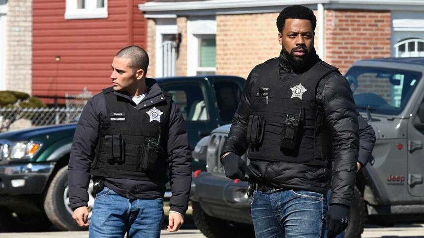 Watch Chicago PD season 11 starring Benjamin Levy Aguilar (L) and LaRoyce Hawkins (R)