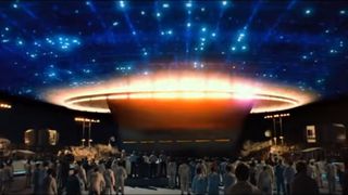 A still from Close Encounters of the Third Kind when the alien ship is hovering above the ground.