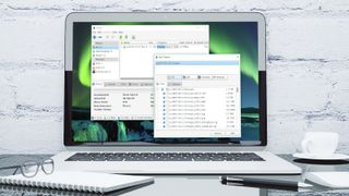 Deluge, one of the best free torrent clients, being displayed on a laptop