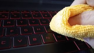 A microfiber cloth on a laptop keyboard