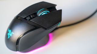 Razer Basilisk V3 Pro with Mouse Dock Pro on a white table