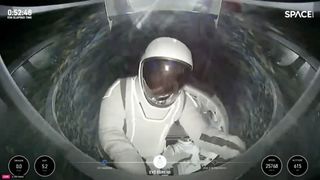 A spacewoman pops out of a spacecraft above earth