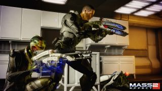 Shepard and Thane pointing guns during Mass Effect 2, one of the best PS3 games.