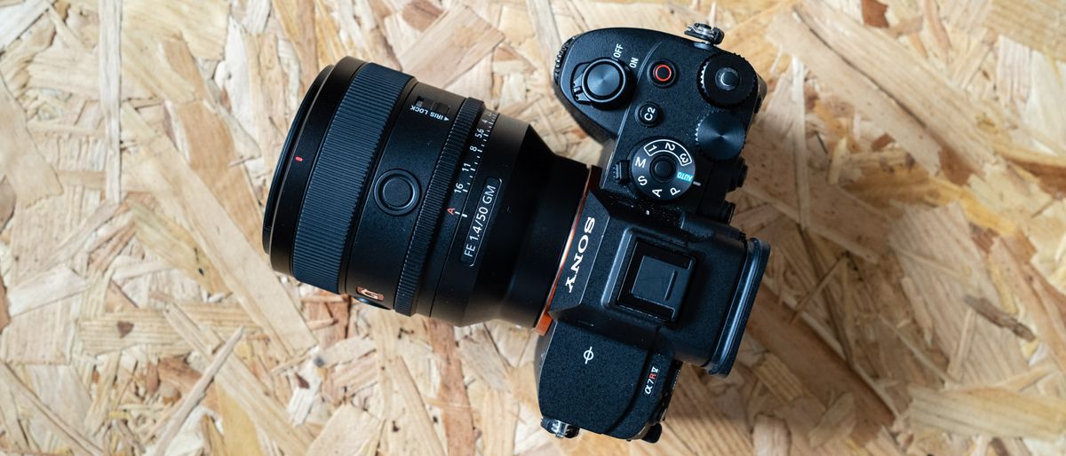 The Sony FE 50mm f1.4 on a chipboard surface