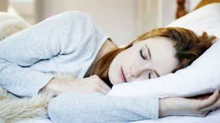 image shows woman sleeping