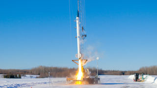 an illustration of a white rocket in orbit above earth