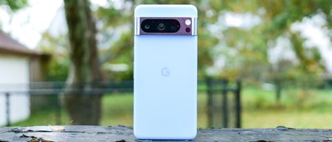 Google Pixel 8 Pro held in hand.