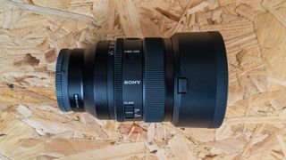 The Sony FE 50mm f1.4 on a chipboard surface