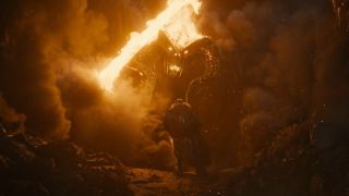 An axe-wielding King Durin charges at the Balrog in The Rings of Power season 2 finale