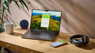 ExpressVPN apps running on a laptop and mobile during TechRadar's testing