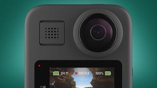 The GoPro Max 360 camera on a green background