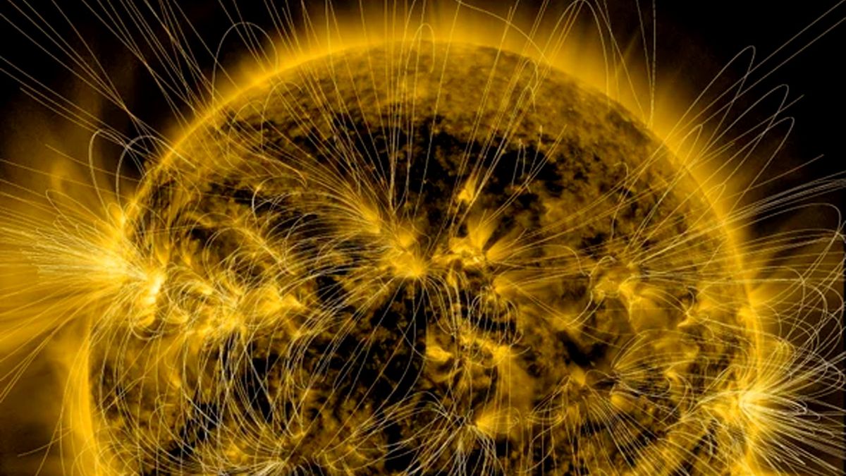 A close up image of the sun&#039;s surface with added magnetic field lines