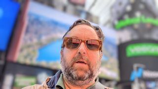 Ray-Ban Meta smart glasses reflecting Times Square on author&#039;s face