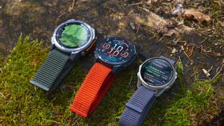 Garmin Fenix 8 watches on the ground outdoors