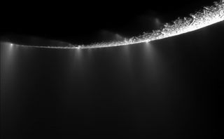 Enceladus's water vapor jets, emitted from the southern polar region.