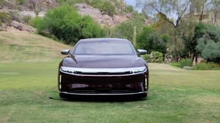 Front view of car parked on grass