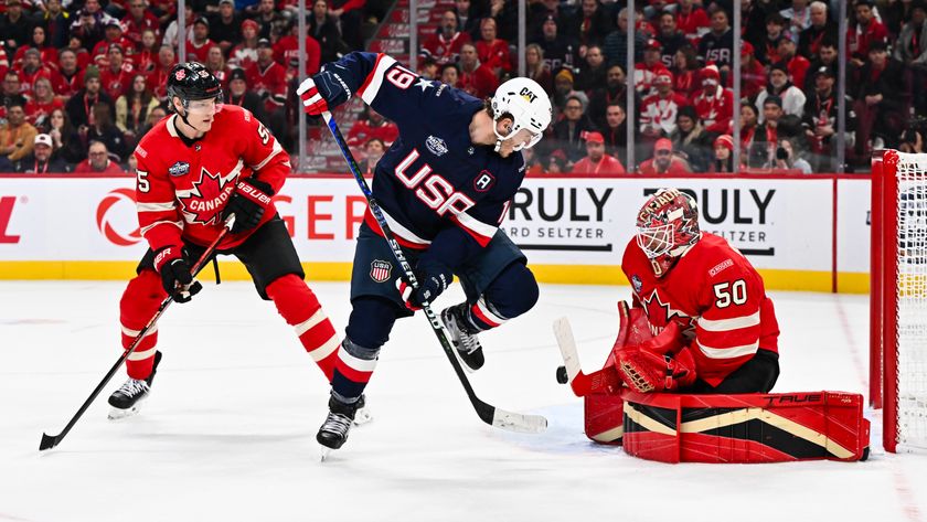 Goaltender Jordan Binnington #50 of Team Canada makes a save near Matthew Tkachuk #19 of Team USA during United States vs Canada in the 2025 NHL 4 Nations Face-Off round robin stage