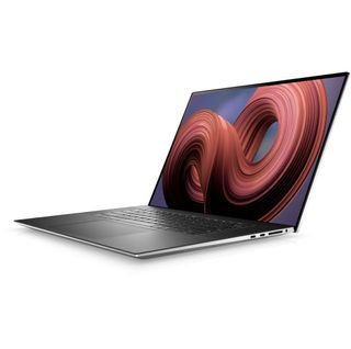 Dell XPS 17 9730 with screen open and desktop background showing